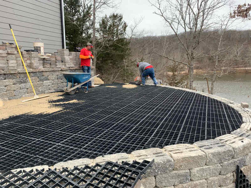 Landscape construction contractors installing the Silca SoilGrid for a patio