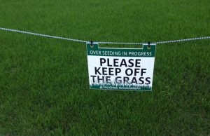 Nice Osage Beach Missouri lawn with a Keep off the grass sign