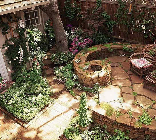 Natural stone patio with a fire pit