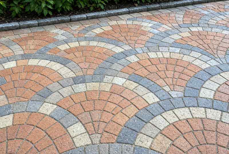 Courtyard patio paved with a European fan pattern design.