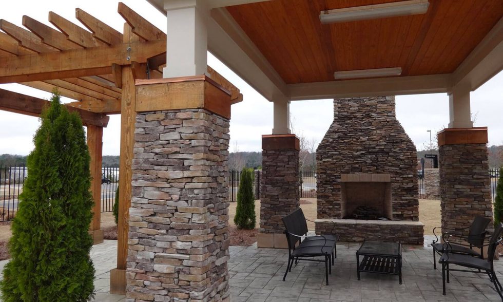 Fall outdoor space with pergola and stone beautiful veneer panels fro exterior use