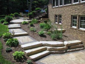 Rosetta Dimensional Steps in a nice hillside landscape opening onto a patio