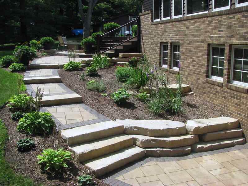 Rosetta Dimensional Steps in a nice hillside landscape opening onto a patio