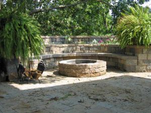 Stone fire pit with circular seating