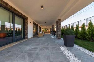 Stone flooring on luxury open terrace.