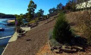 Gravel ground cover and stone steps on a lakeside Missouri slope at Lake of the Ozarks.